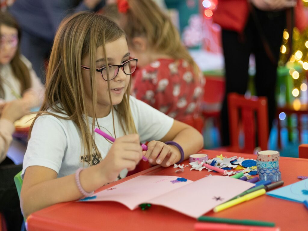 A list of 25 fun winter activities for families, including indoor and outdoor winter activities for preschoolers, toddlers, and kids. Activities include decorating the Christmas tree, writing letters to Santa, baking cookies, sledding, creating DIY ornaments, and making snow globes. These ideas are perfect for creating family traditions and embracing the holiday spirit while keeping kids engaged.