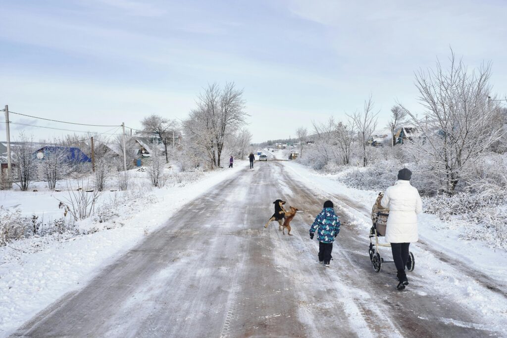 A list of 25 fun winter activities for families, including indoor and outdoor winter activities for preschoolers, toddlers, and kids. Activities include decorating the Christmas tree, writing letters to Santa, baking cookies, sledding, creating DIY ornaments, and making snow globes. These ideas are perfect for creating family traditions and embracing the holiday spirit while keeping kids engaged.