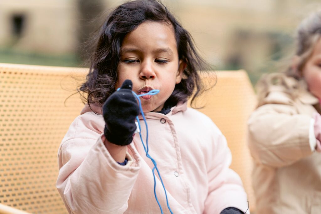 A list of 25 fun winter activities for families, including indoor and outdoor winter activities for preschoolers, toddlers, and kids. Activities include decorating the Christmas tree, writing letters to Santa, baking cookies, sledding, creating DIY ornaments, and making snow globes. These ideas are perfect for creating family traditions and embracing the holiday spirit while keeping kids engaged.