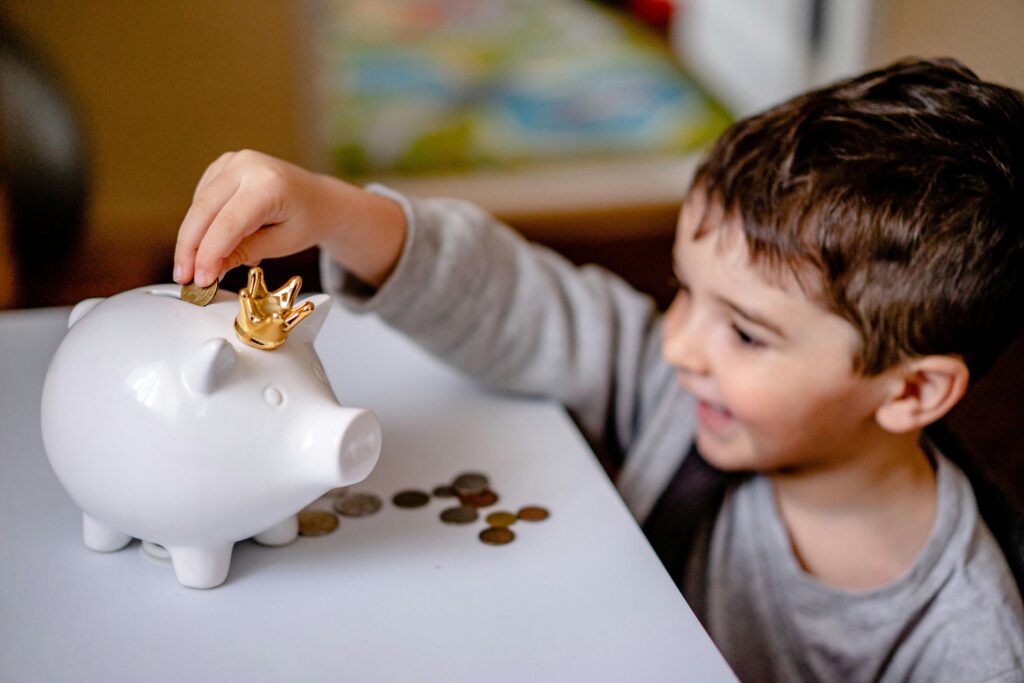 How to set your children up for financial success" outlines seven key steps, including opening high-yield savings and 529 accounts, converting unused 529 funds to a Roth IRA, and using custodial accounts like UGMA and UTMA. It also covers building credit early, teaching financial literacy with tools like Money Monsters, and more. Keywords: education savings account, best investment for a child, how to invest money for your child, raising financially responsible children.