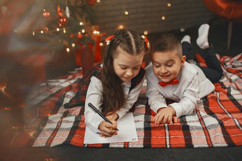 A list of 25 fun winter activities for families, including indoor and outdoor winter activities for preschoolers, toddlers, and kids. Activities include decorating the Christmas tree, writing letters to Santa, baking cookies, sledding, creating DIY ornaments, and making snow globes. These ideas are perfect for creating family traditions and embracing the holiday spirit while keeping kids engaged.