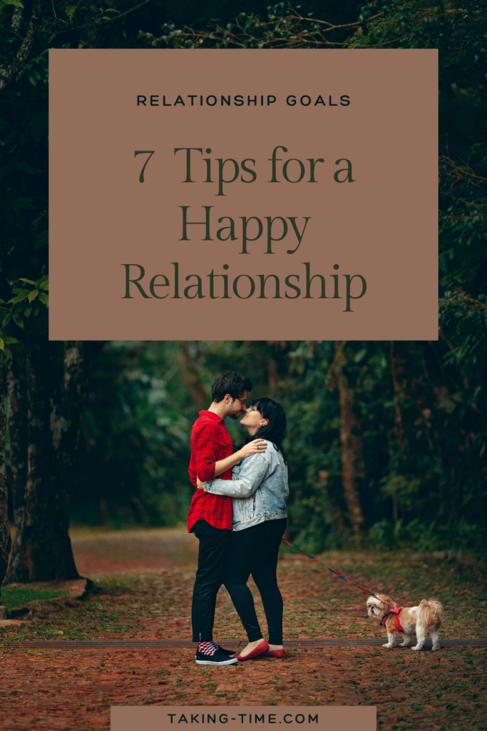 A couple smiling and holding hands, illustrating relationship goals and the key traits of a healthy relationship like communication, trust, and growth.